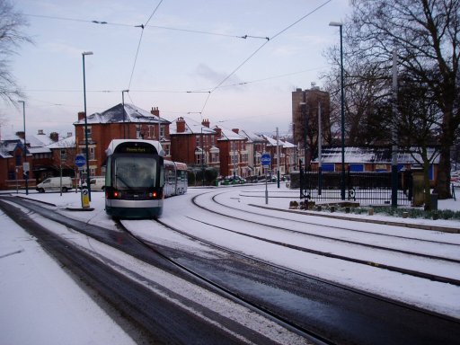 Nottingham Express Transit tram snow at Mount Hooton Road
