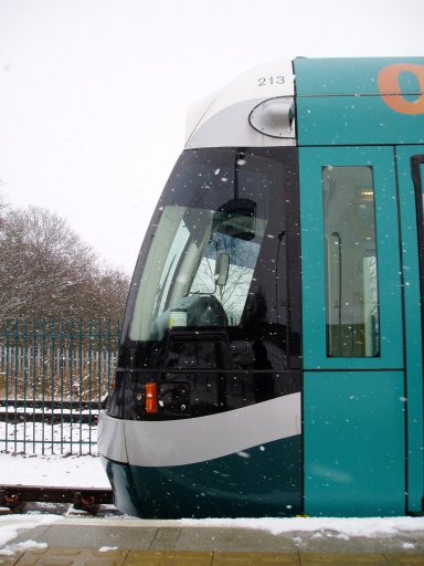 Nottingham Express Transit tram snow at Butler's Hill stop