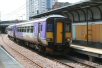 Sprinter passing Stadium of Light